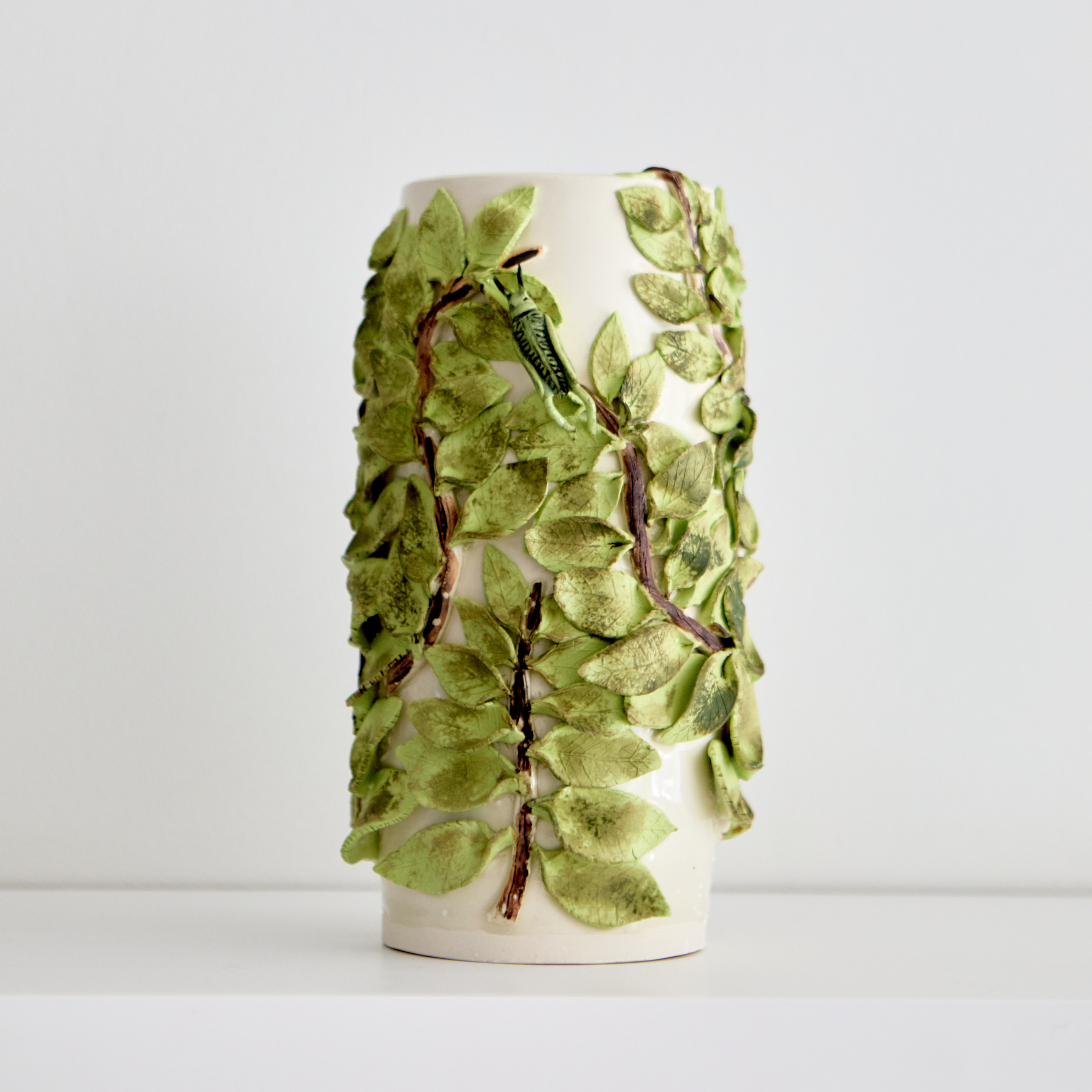 Corn, Wendy - Vase leaves with grasshoppers